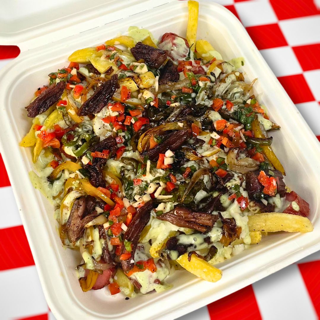 Salchipapa cargada de Munchies