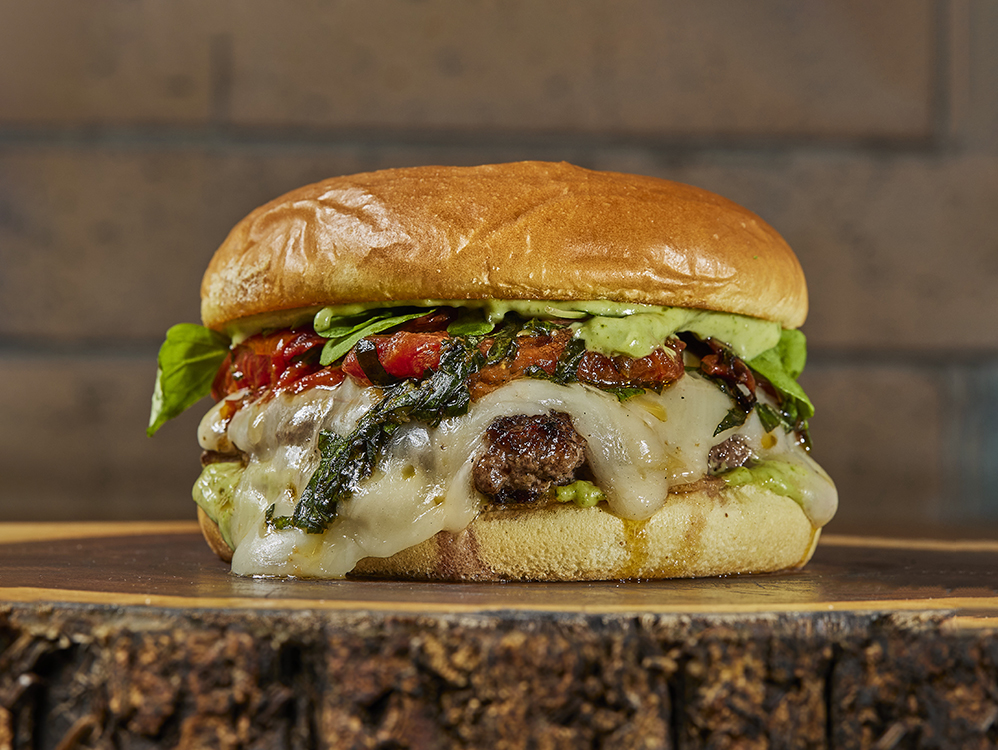 Burger de Granjero Burger con queso derretido y tomate