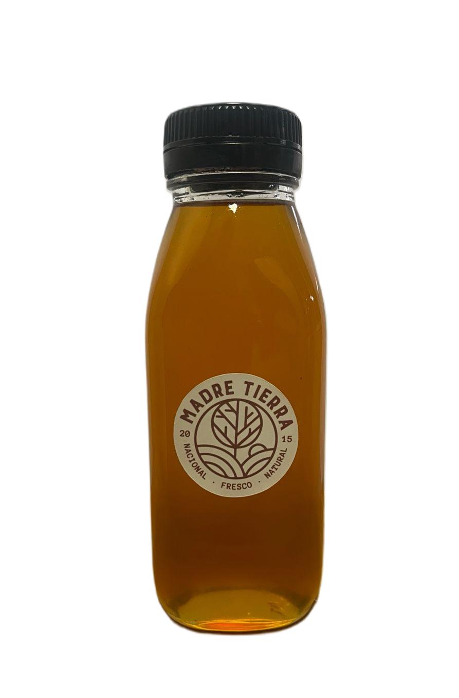 Botella de miel con la etiqueta de Madre Tierra